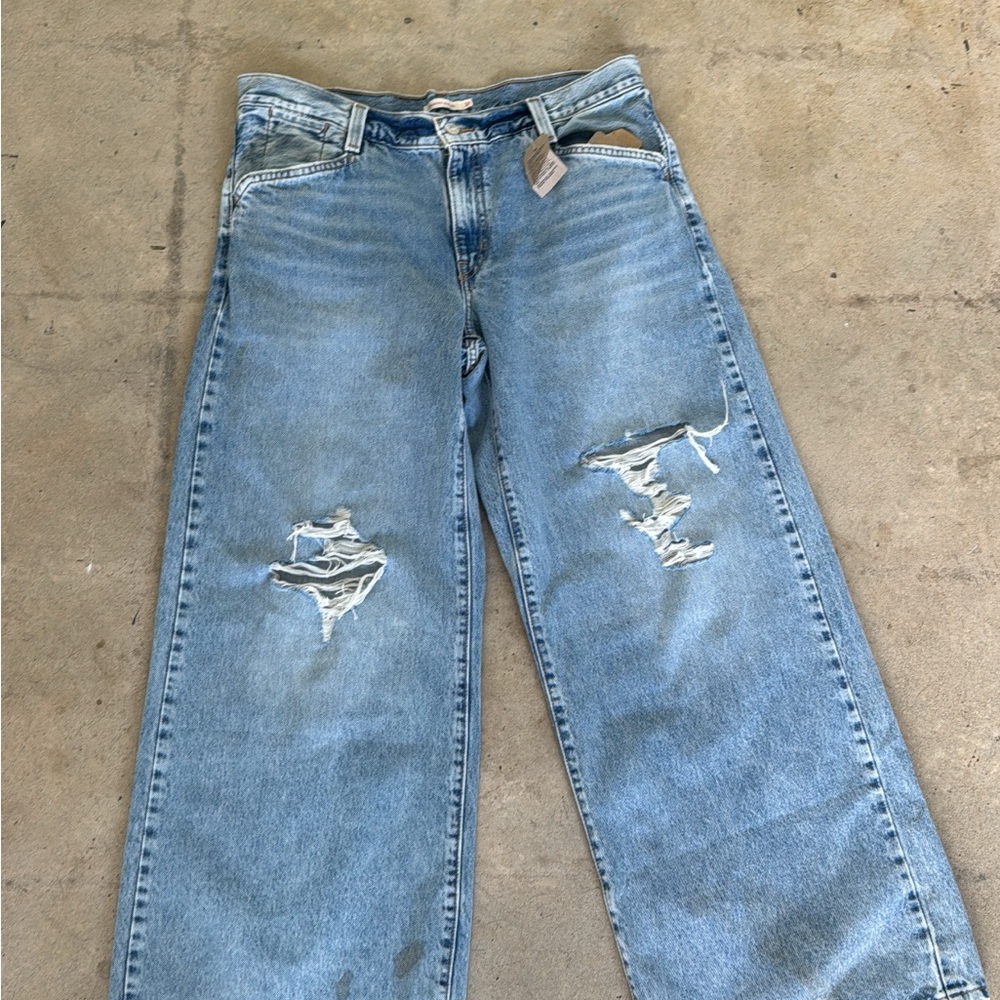 Distressed Light Blue Jeans